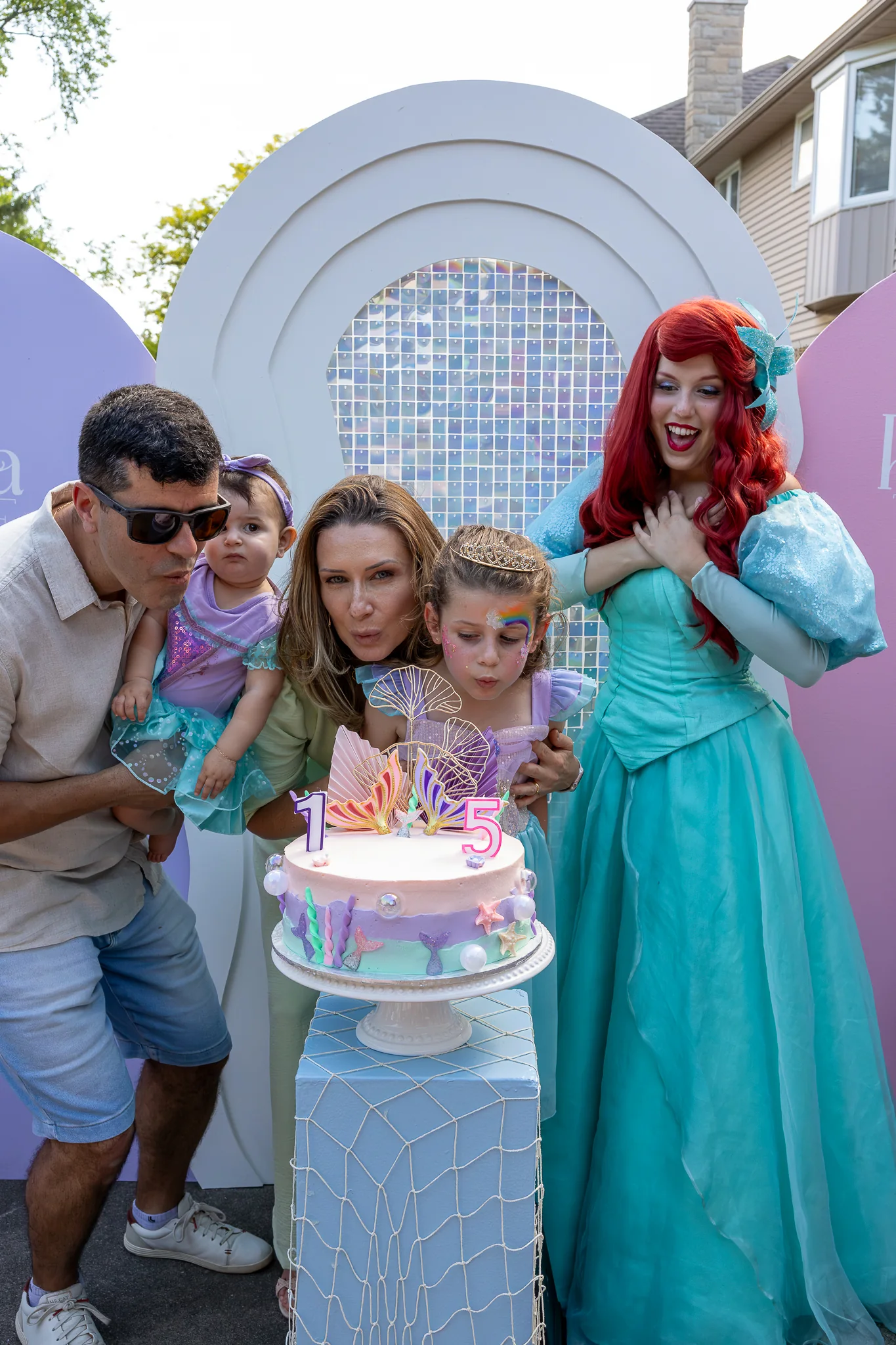 Family celebrating a child’s birthday party